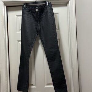 Straight leg satin faux leather finish on jeans makes it unique.